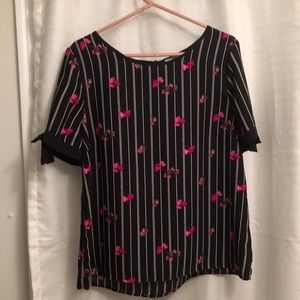 Colourful stripped too with bow detail in the arms. Size L